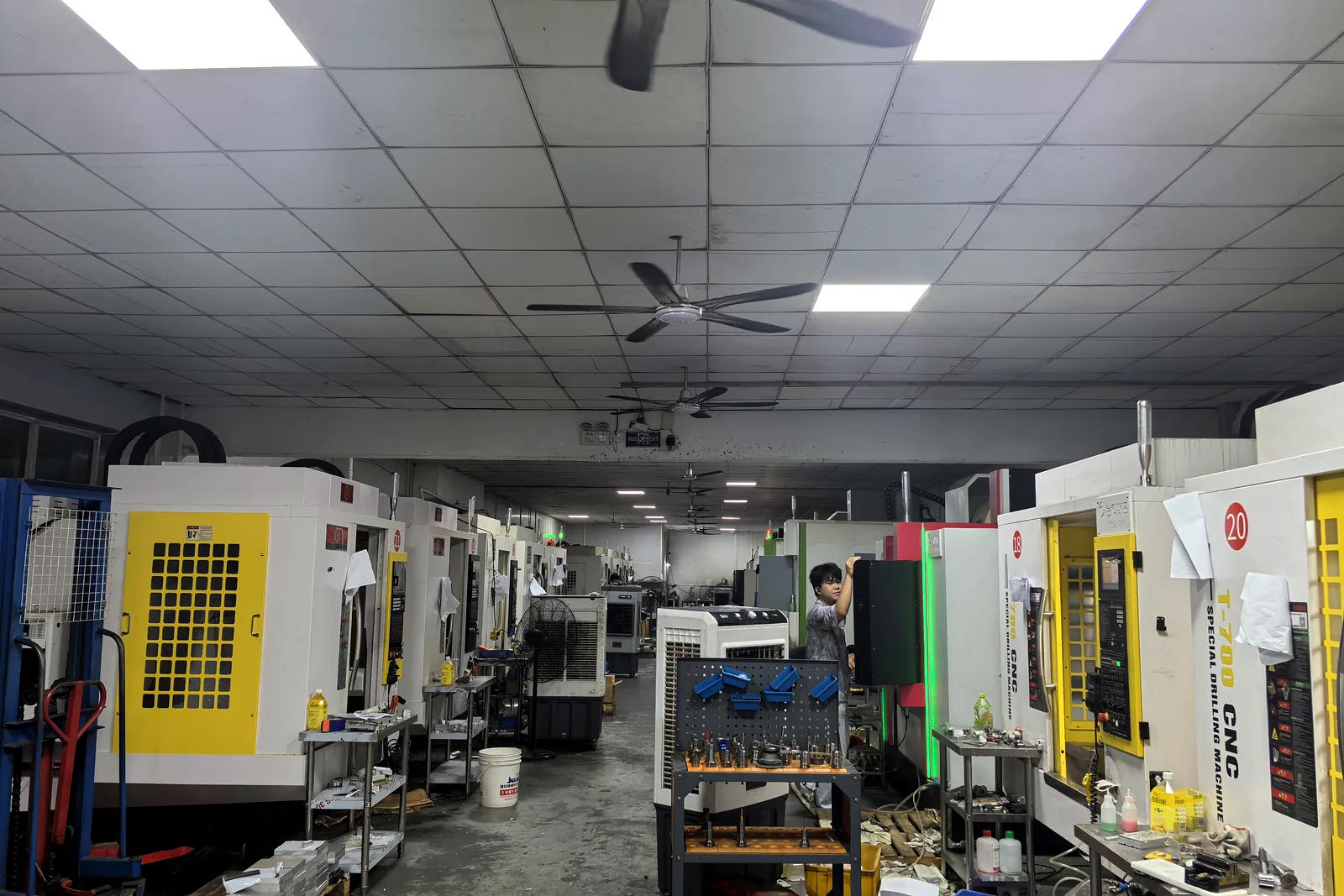Production aisle inside the One Part CNC factory